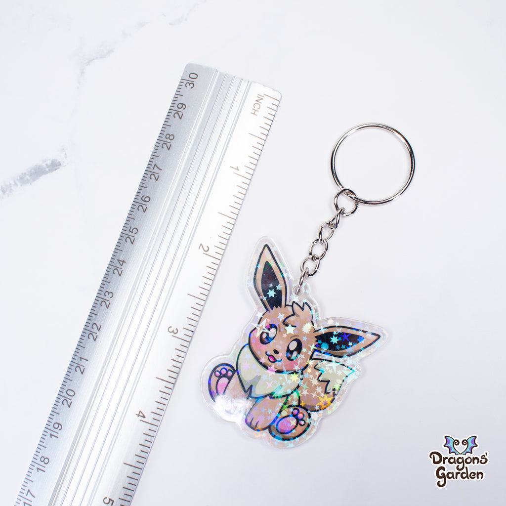 Eevee and Ditto Face Pokemon | Holographic Acrylic Keychain - Dragons' Garden