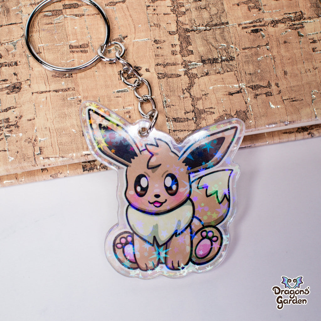 Eevee and Ditto Face Pokemon | Holographic Acrylic Keychain - Dragons' Garden - Keychain Keychain