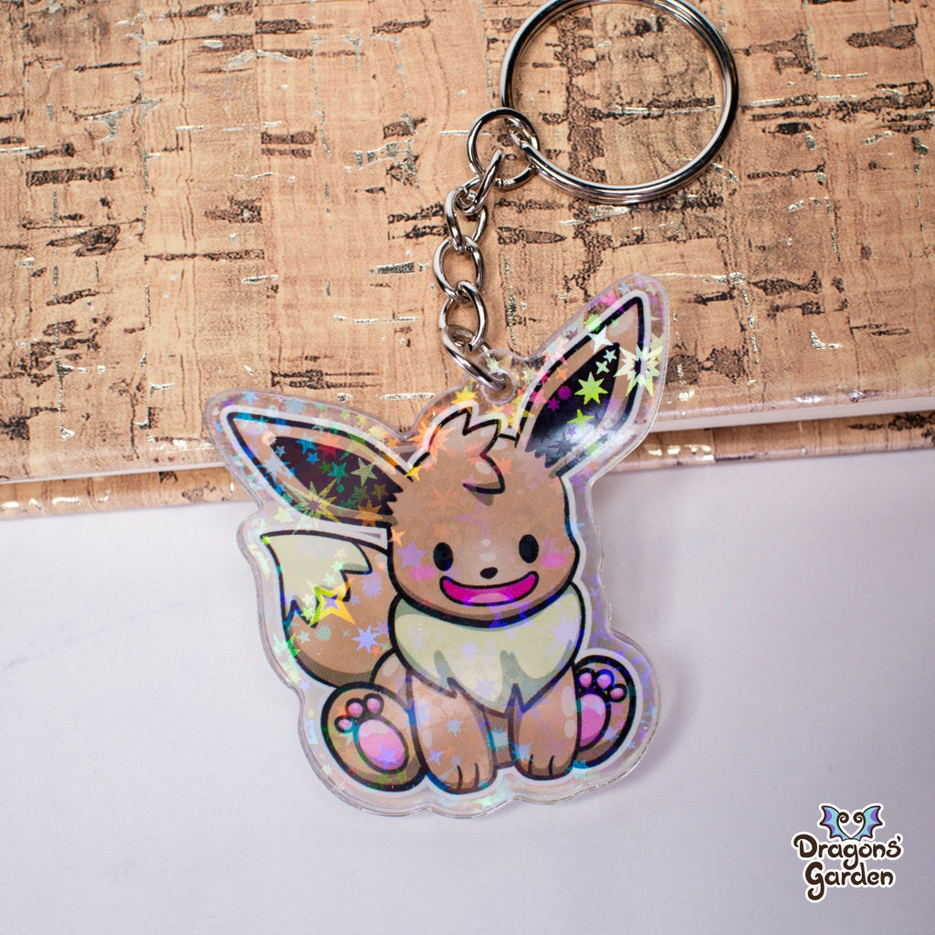 Eevee and Ditto Face Pokemon | Holographic Acrylic Keychain - Dragons' Garden - Keychain Keychain