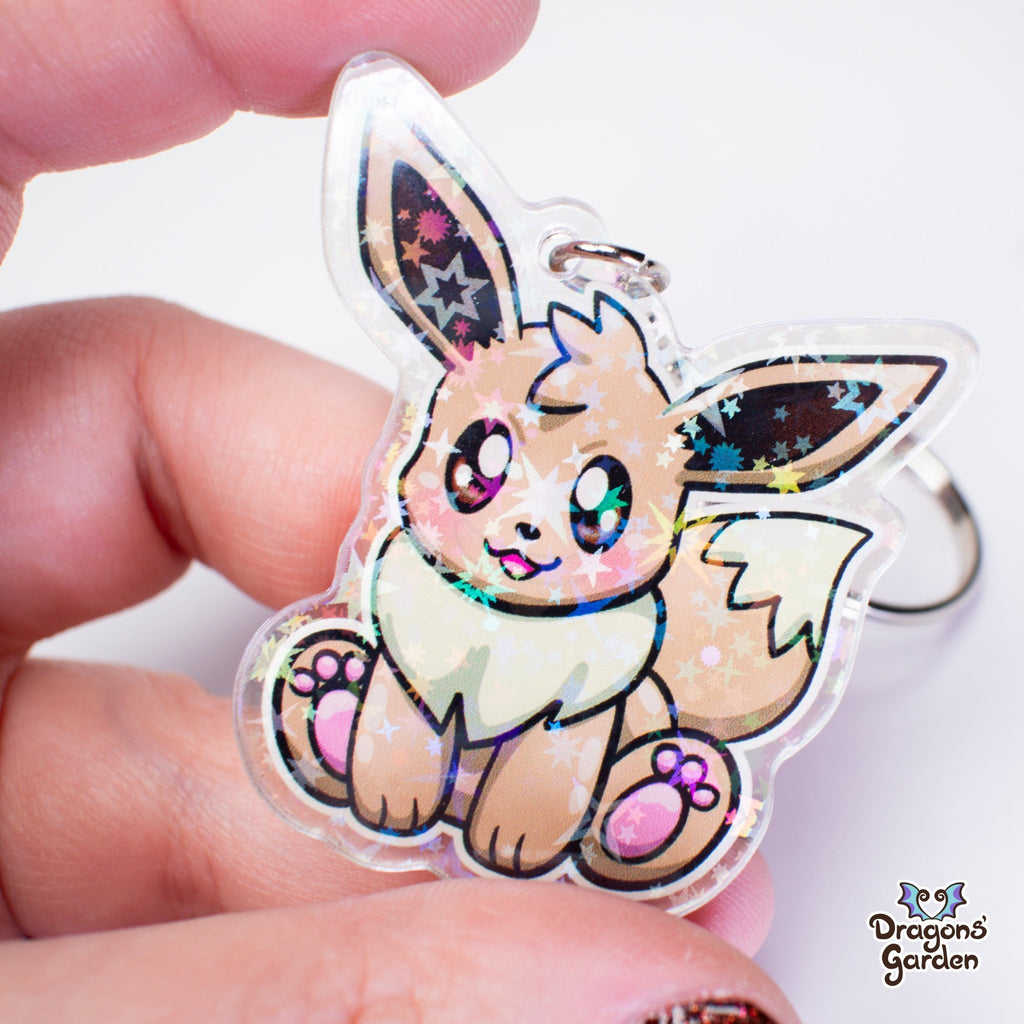 Eevee and Ditto Face Pokemon | Holographic Acrylic Keychain - Dragons' Garden - Keychain Keychain
